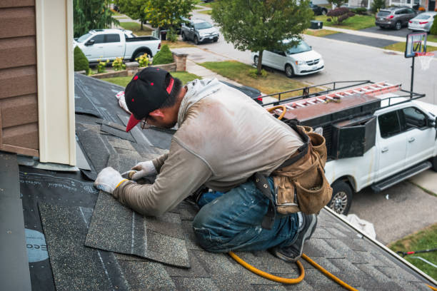 Professional Roof Repair technician working in Muldoon, TX